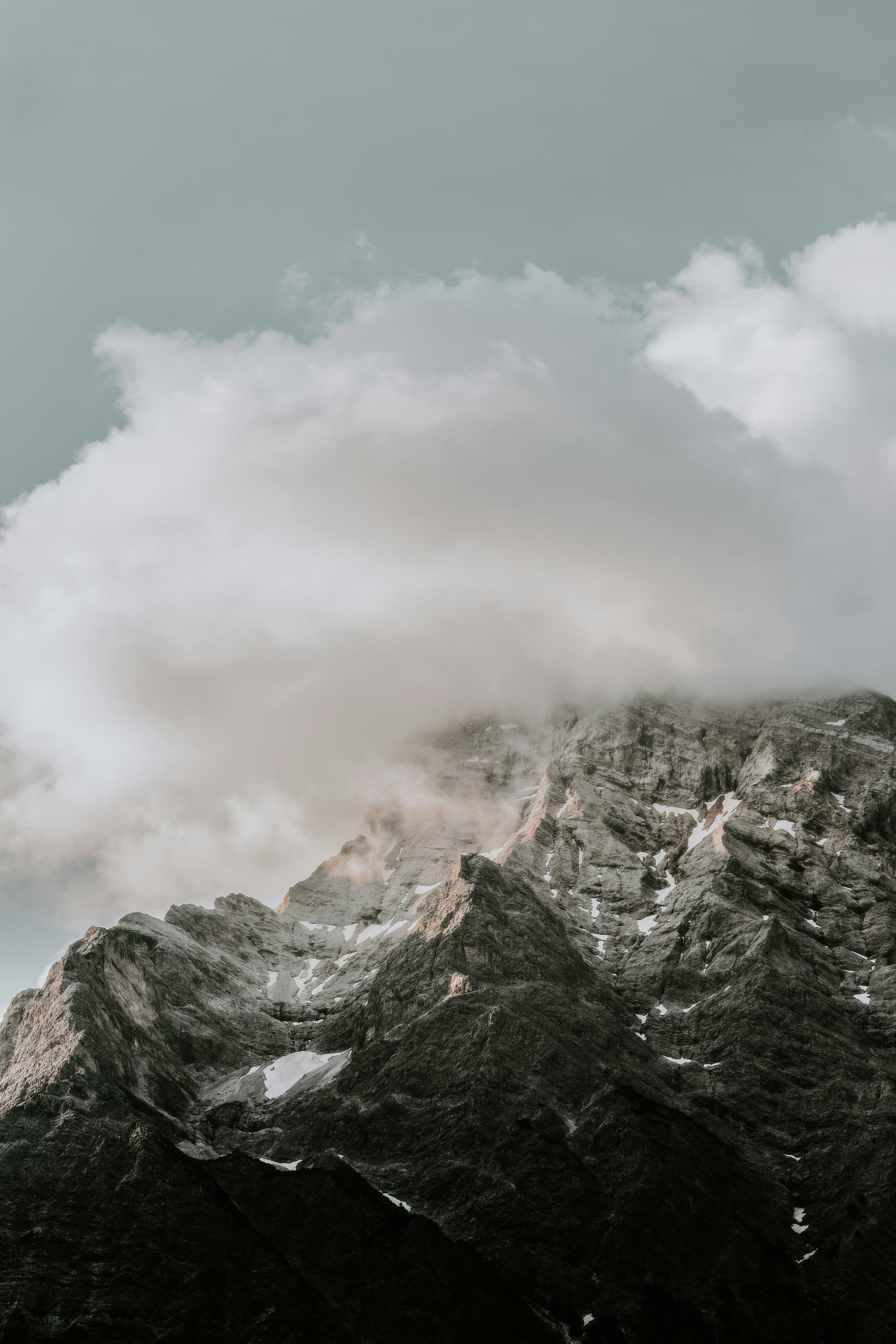 clouds covering mountains